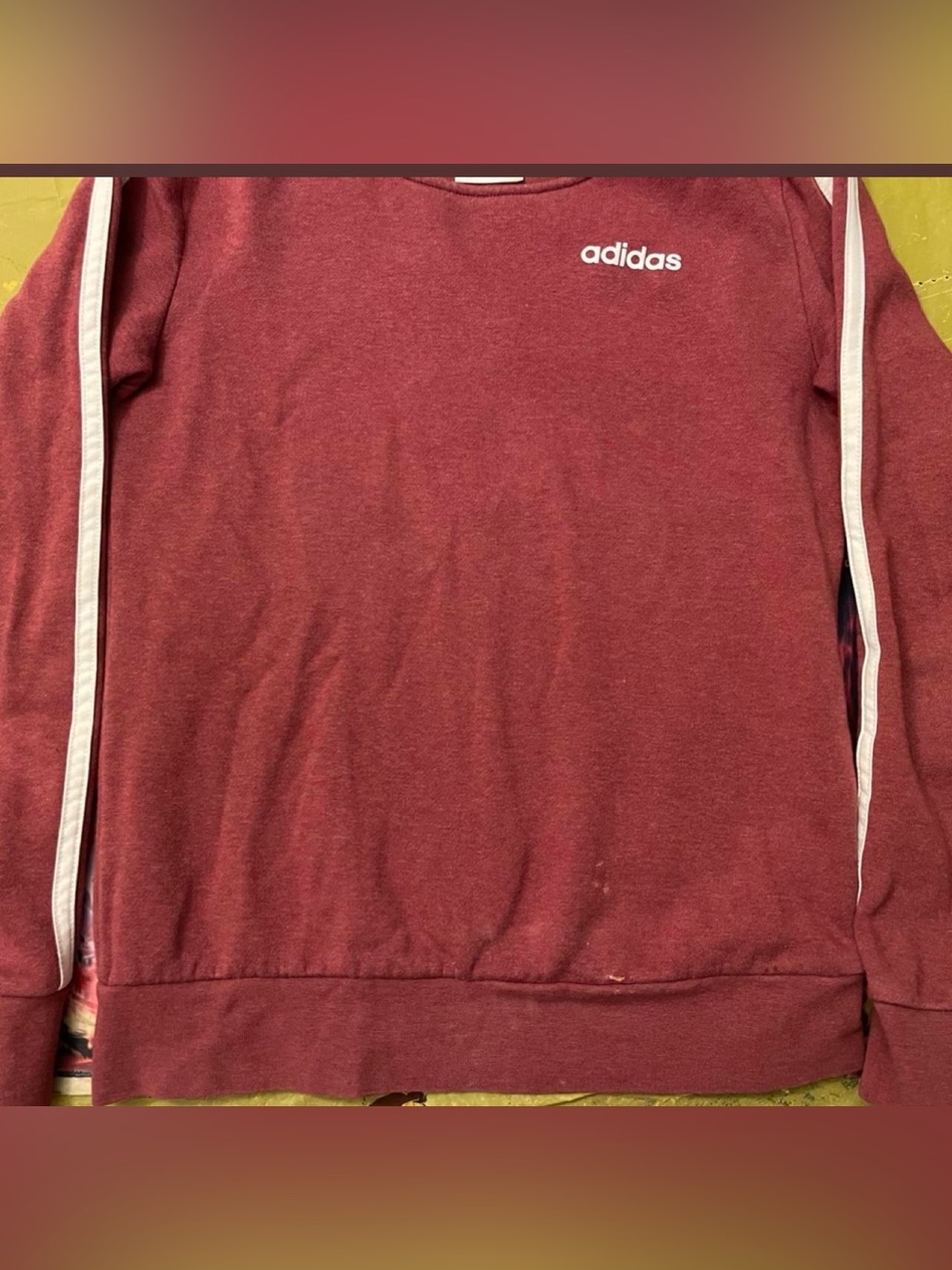Adidas burgundy sweatshirt with white stripes on sleeves